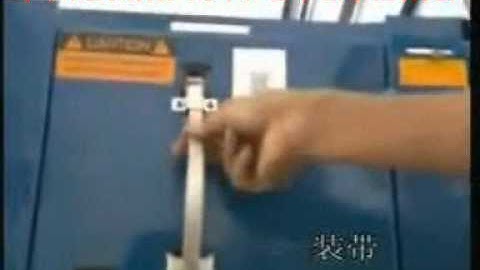 PACKMACH SEMIAUTOMIC STRAPPING MACHINE.mpg