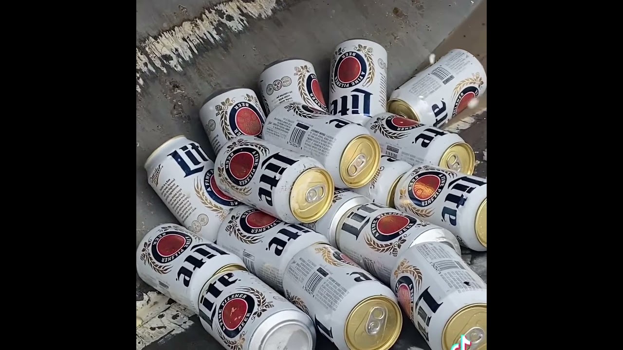 The ultimate can crusher. Beer Tower explodes in trash truck