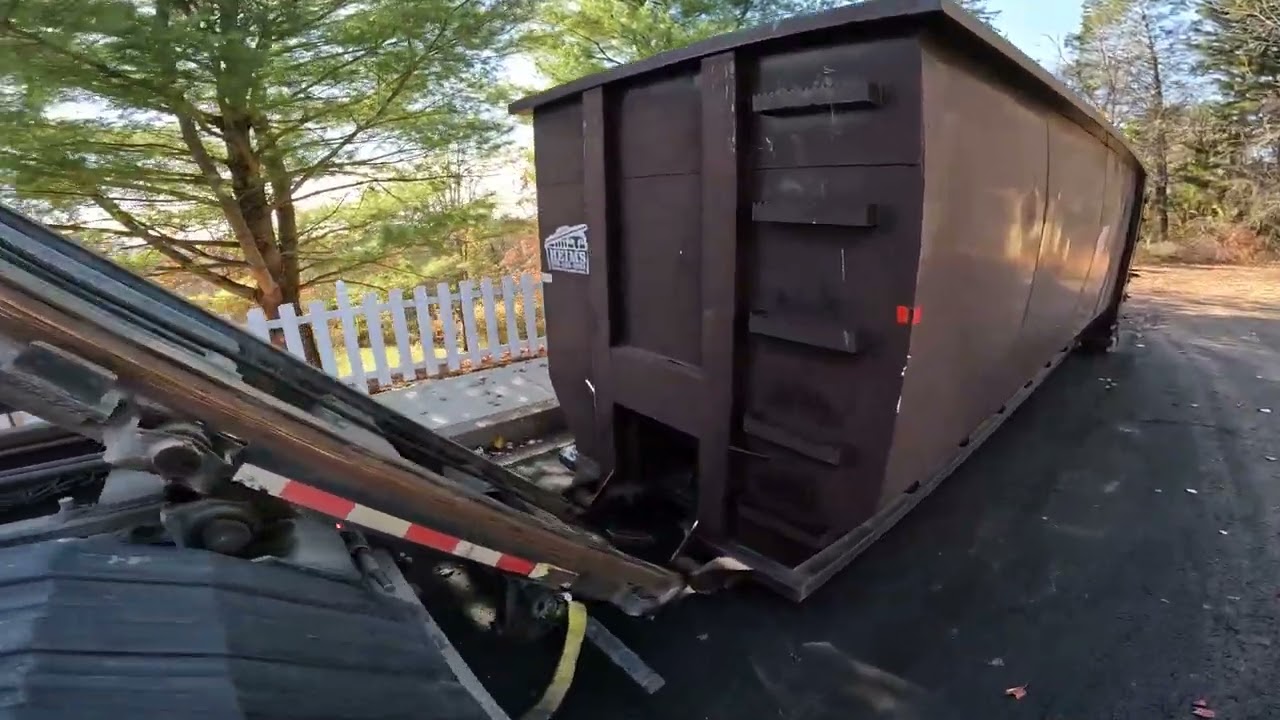 Loading a 40 Yard Roll-Off full of over 18 tons of Shingles!