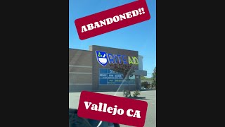 Looking inside ABANDONED, Rite Aid, Vallejo CA.
