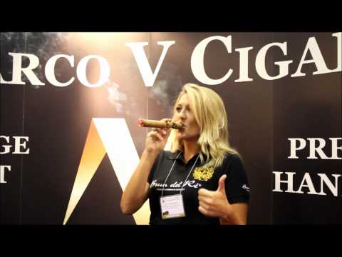 Beautiful Woman Smoking a Marco V King at IPCPR 2012