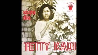 Video thumbnail of "TETTY KADI - PERGI KE BULAN"