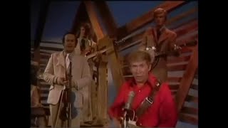 Watch Buck Owens Heartaches By The Number video