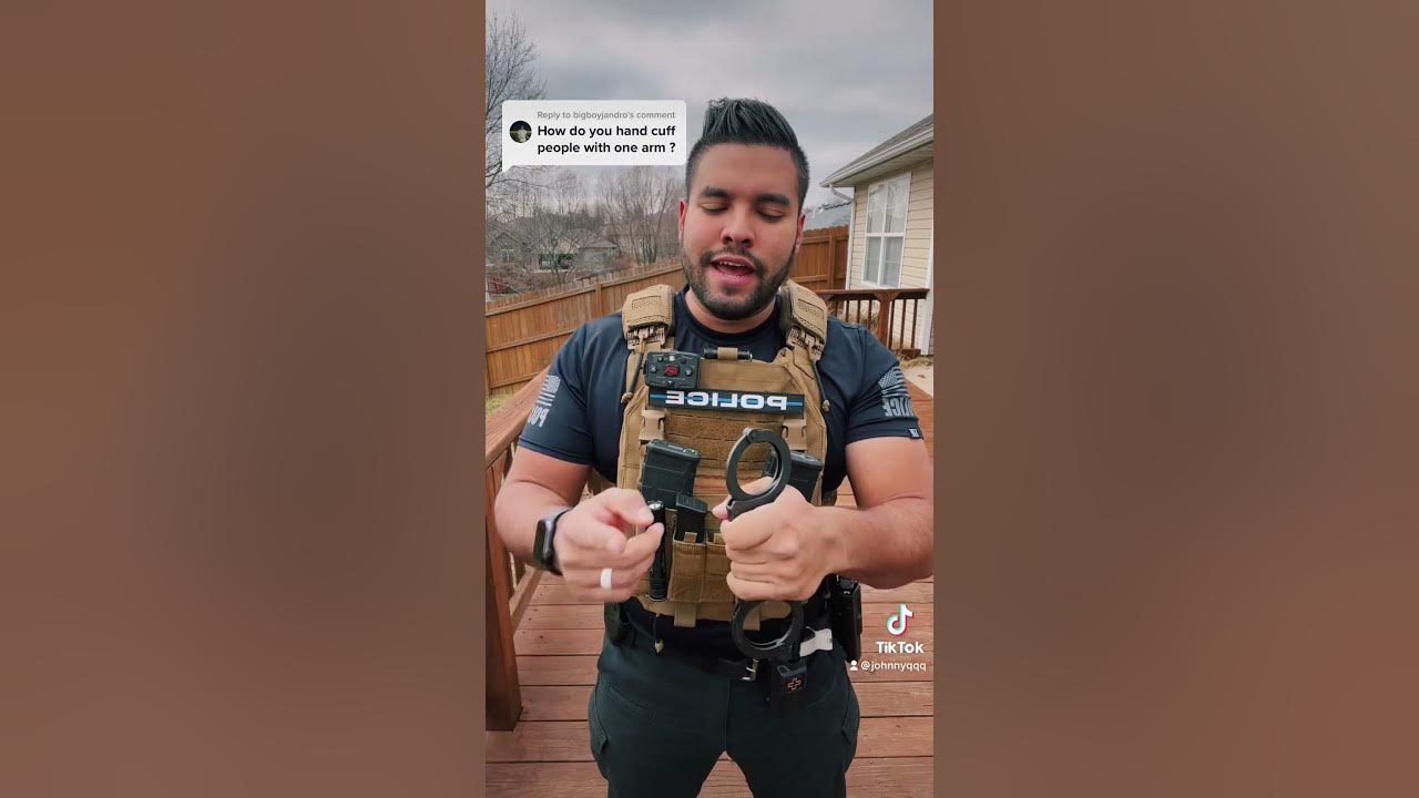 Putting handcuffs on someone with 1 arm! YouTube