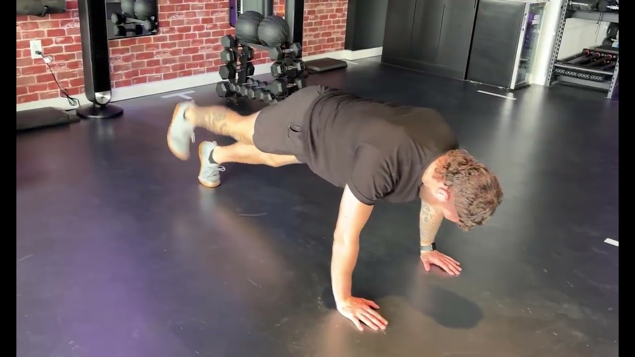 Plank Roll Toe Tap