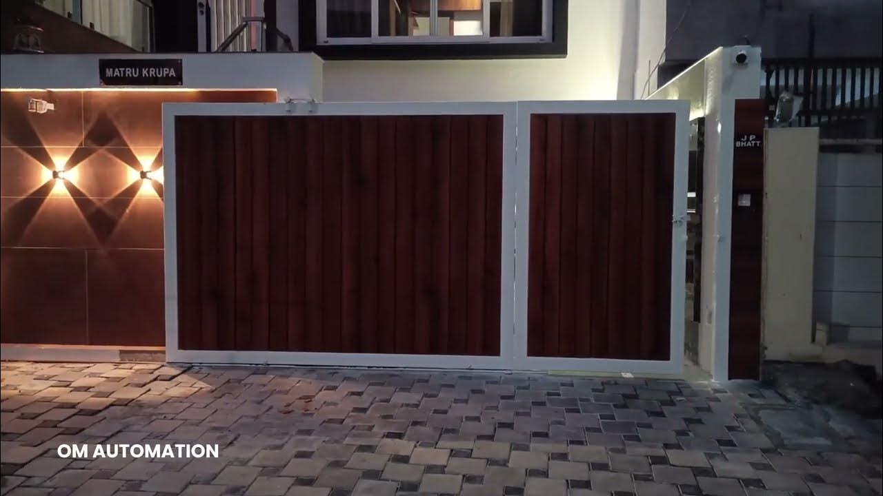 Automatic Sliding Gate With Wicket Gate irongate gatedesigns automatic-sliding-gate-with-wicket-gate-irongate-gatedesigns