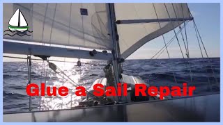 GLUE A SAIL Repair at Sea properly, and it will last for YEARS!  Patrick Childress Sailing Tips#23