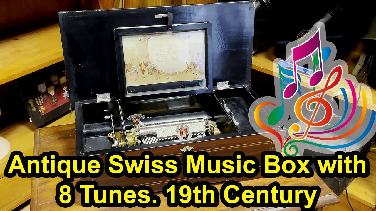 CM-D-572- Antique Swiss Music Box with 8 Tunes Excellent Condition