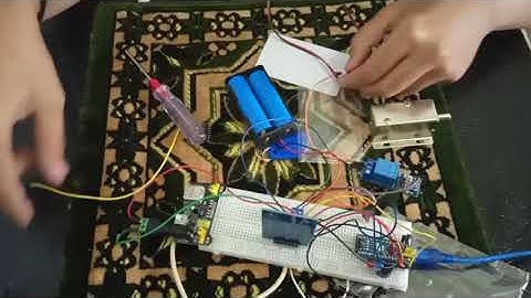 Sistem Kunci Pintu Otomatis Menggunakan RFID