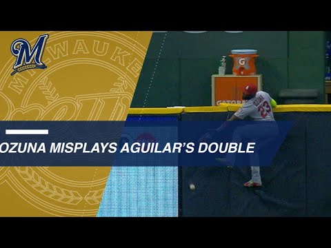 2 Brewers score on Ozuna's misplay at LF wall