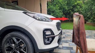 How to adjust headlight aim in Kia Sportage