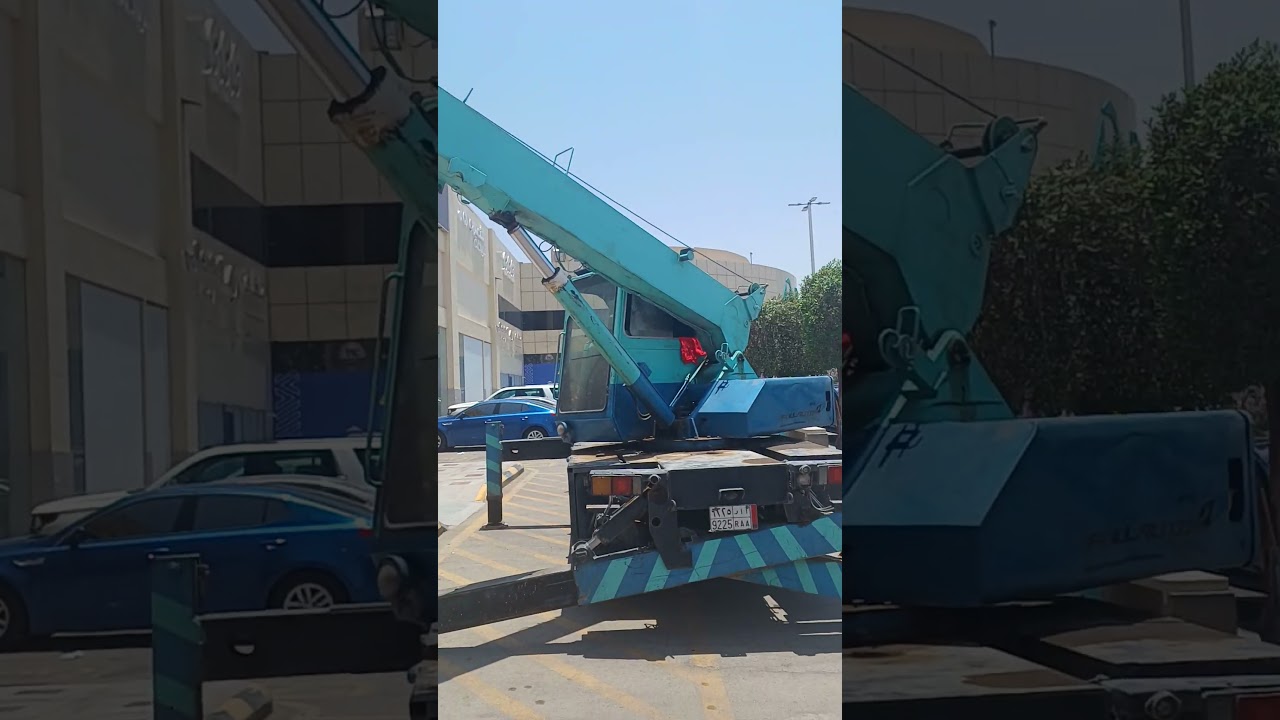 backhow carying worker. 