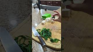 Healthy appetizer/snack: Garlic chives wrapped tofu with spicy Korean Gochujang dipping sauce.