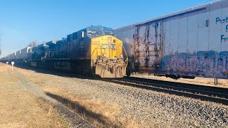 Highest priority CSX intermodal roars past crawling manifest, surprise end of train DPU on CP & more