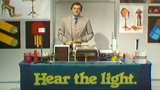 Bell Labs' Henry Feinberg Demonstrates Ways of Using Light to Transmit Sound Waves, 1978