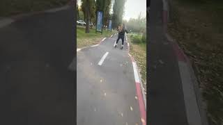Roller Blader Loses Her Balance, Falls Then Laughs It Off
