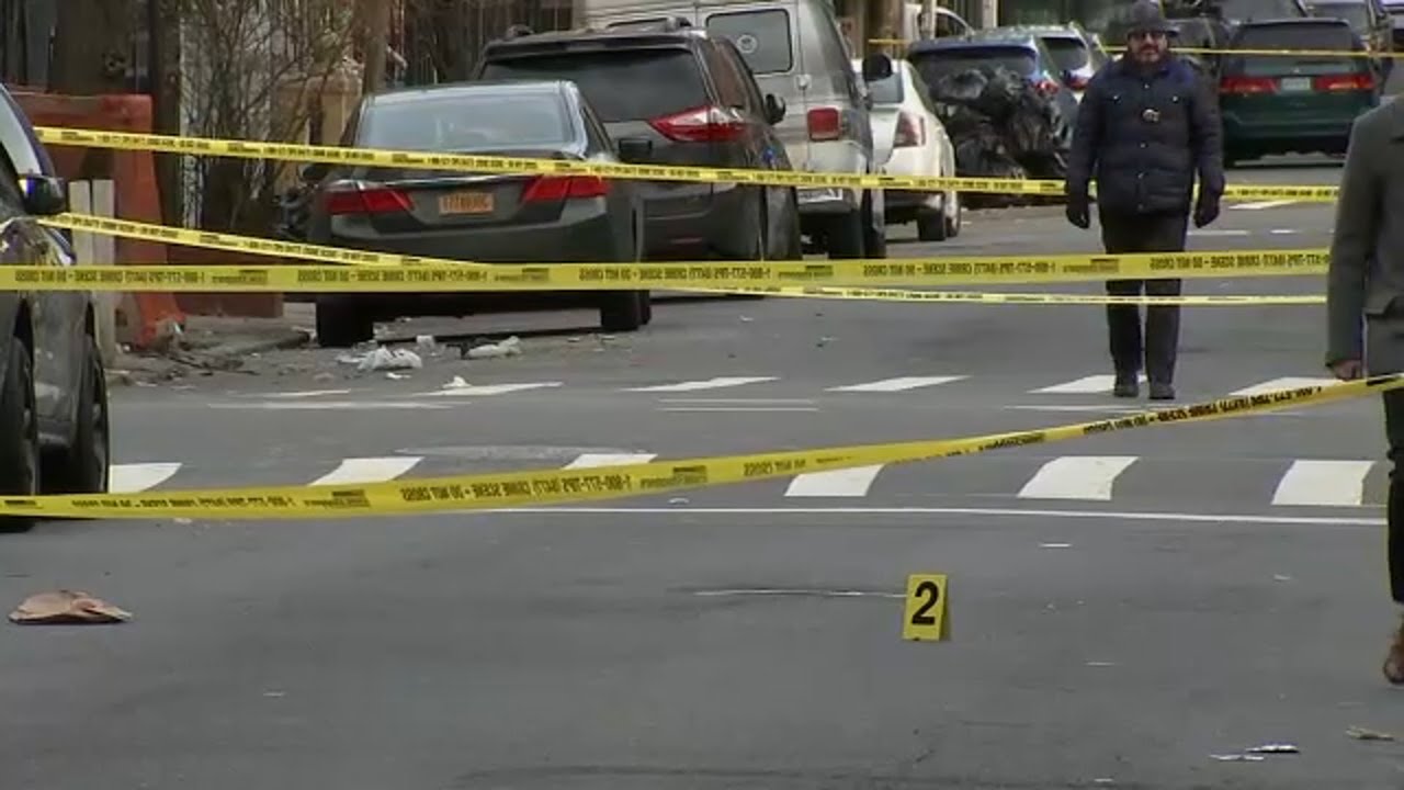 NYPD officer shot in the Bronx, 2 suspects still at large - YouTube