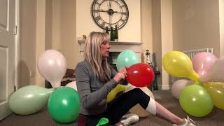 Looner Girl Blowing Up A Red Balloon