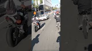 Porsche gets kicked from motorcycle rider😳😳 #shorts #short #surron