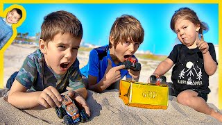 Toy Monster Trucks Find Pretend Play Buried Gold at the Beach