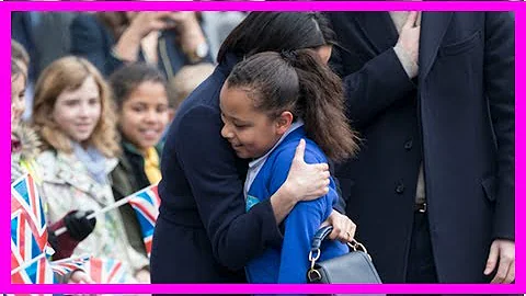 Meghan Markle couldn�t help but break royal protocol to hug a 10-year-old school girl in Birmingham