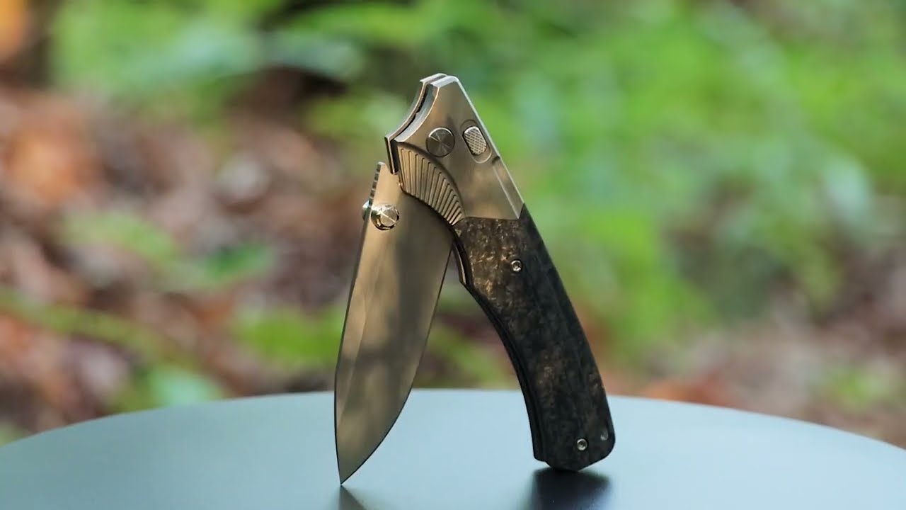 REMETTE Folding knife (WD107) button lock,M390 blade,carbon fiber inlaid titanium alloy frame handle