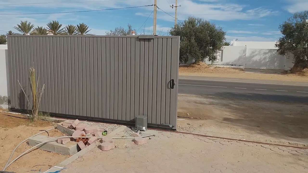 porte coulissante double tole motorise somfy