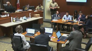Iowa suspect blames mystery men for slaying