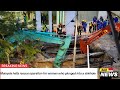 Malaysia halts rescue operation for woman who plunged into sinkhole