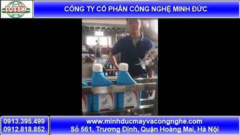Máy chiết rót nắp chai tự động chính xác Minh Đức