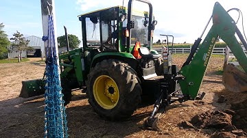 Trenching with tractor Backhoe