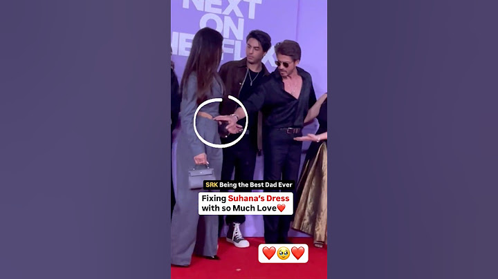 Shah Rukh Khan fixes daughter Suhana Khan’s dress in front of media 🥹 #shorts #shahrukh