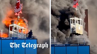 video: Watch: Worker winched to safety from burning tower block