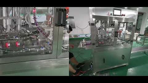 Automatic dual head spout pouch filling capping machine