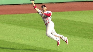 Jay lays out to make grab in center