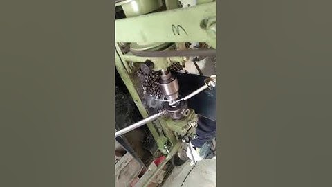 Horizontal taping threading machine