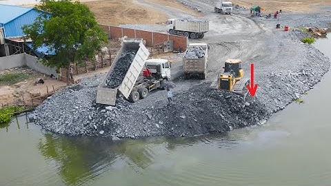 Today best action showing strong Bulldozer SHANTUI push clear rock into water with team dump truck
