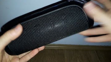 How to turn on low frequency mode on a JBL Flip 4