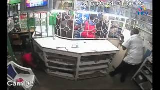 Gangland style armed robbery captured by CCTV cameras