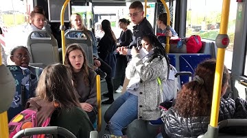 High School Chorus Sings on Airport Shuttle While Stranded in Paris