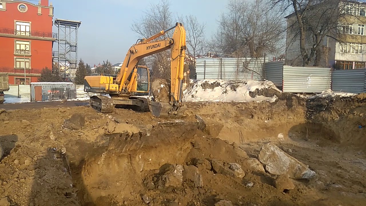 Котлованы.Алматы 87077335555.Разработка мерзлого грунта.Роем.Земляные ...