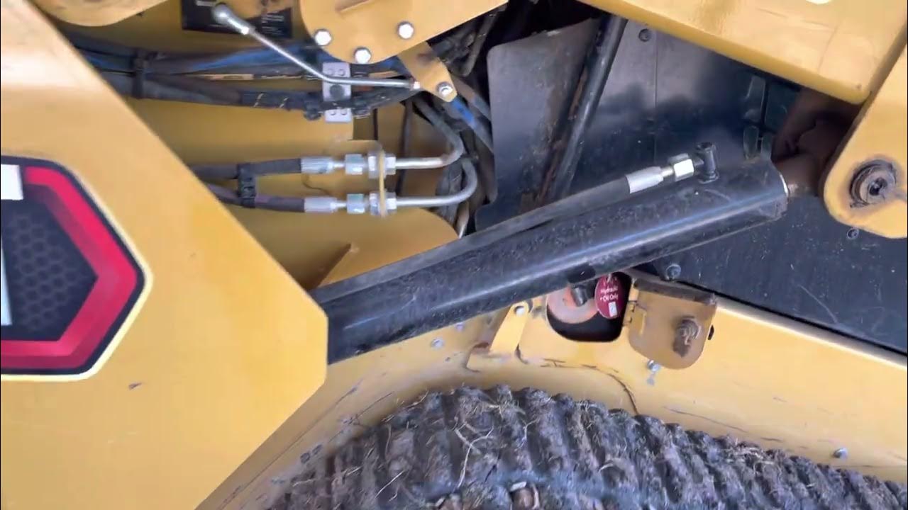 CAT 259D3 Hydraulic Fluid Drain if Overfilled YouTube