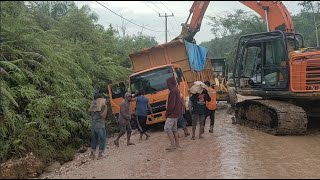 Panic Truck Driver Has Difficulty Turning the Steering Wheel Due to Being Forced by the Excavator