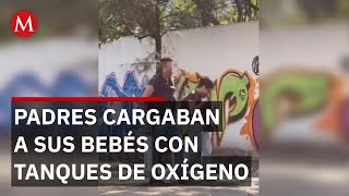 Identifican a pareja que cargaban a sus bebés con tanques de oxígeno