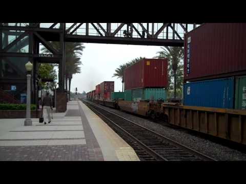 My last bit of footage from my trip to Fullerton.... 1st up is Metrolink Outbound From LA with Engine 901. Then finally my last clip- BNSF Eastbound Leaving Long Beach passing the Fullerton Station. BNSF power is: Lead # 7347 - 5171 - 5203 - 7354 . The last clip is of a MOL Container... MOL stands for: Mitsui OSK Lines. A merger of 2 Japanese companies in 1964- (way before my life began) The logo was designed by Ryohei Yanagihara in 1968. The alligator was chosen because it was an amphibian- denoting " land " and " sea " service. He designed it to be aggressive, yet friendy. The red ring is a lifebuoy and the alligator sports an anchor tattoo on it's arm... This is one of my favorite containers... Hope you enjoyed the history lesson also- thanks wikipedia ; ) I hope to back in Fullerton soon- until next time have fun and be safe! This was also filmed on July 10, 2010......................