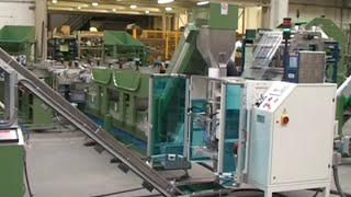 (ENGLISH) -- Packaging line for furniture kits including a vertical packaging machine Microvert, six counting modules CMF5 and an 