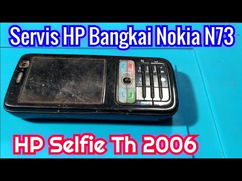 Video: Cara Melepas Casing Nokia N73