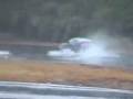 Vaughn Gittin Jr. practicing in the pouring rain in the 2010 Mustang at the YZ circuit