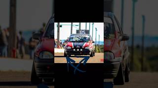 pq os carros de corrida andam com cambagem negativa?