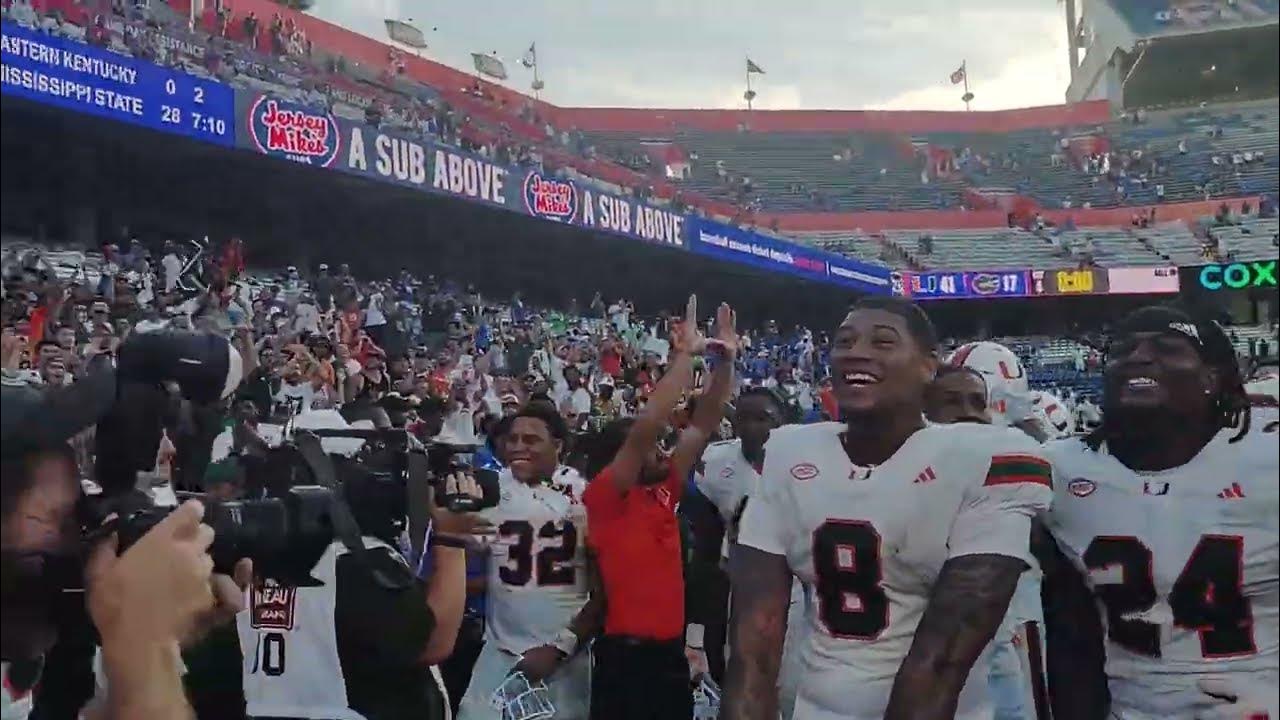 Miami Hurricanes football players celebrating a key win